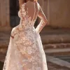 robe de mariée manches longues en dentelle et perles